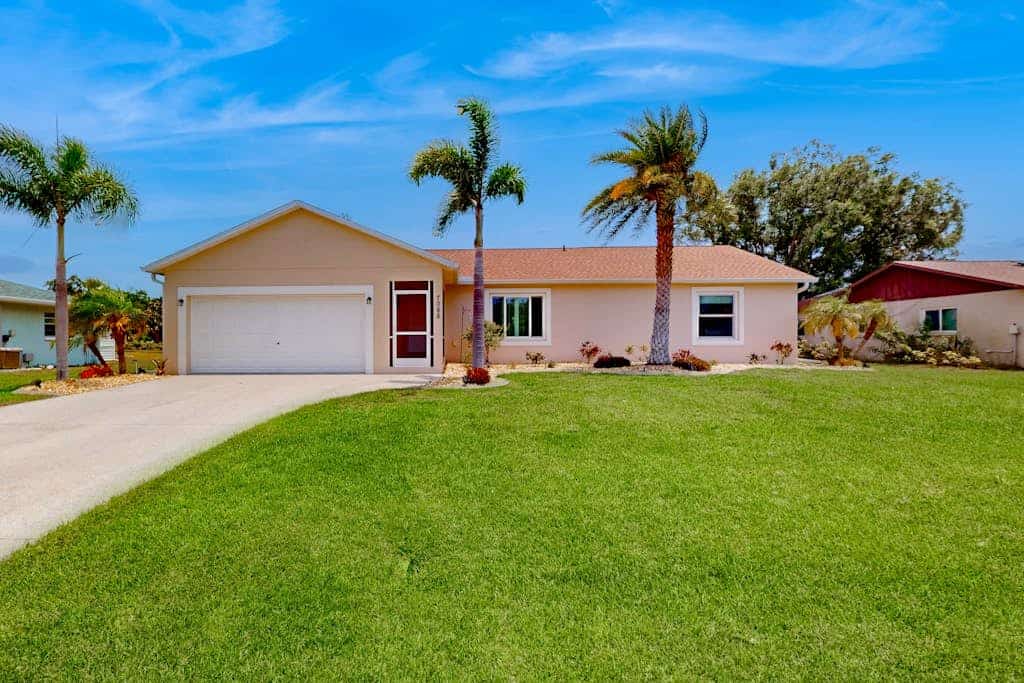 Inviting home w/ screened pool, lovely patio & upgraded interior - beach nearby