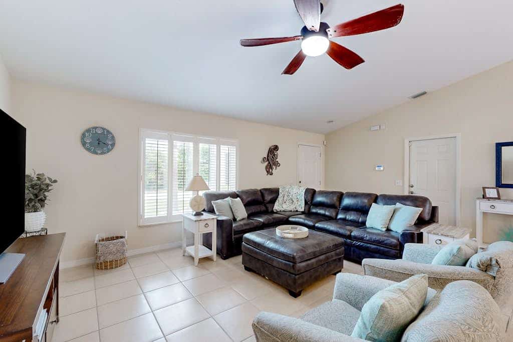 Inviting home w/ screened pool, lovely patio & upgraded interior - beach nearby