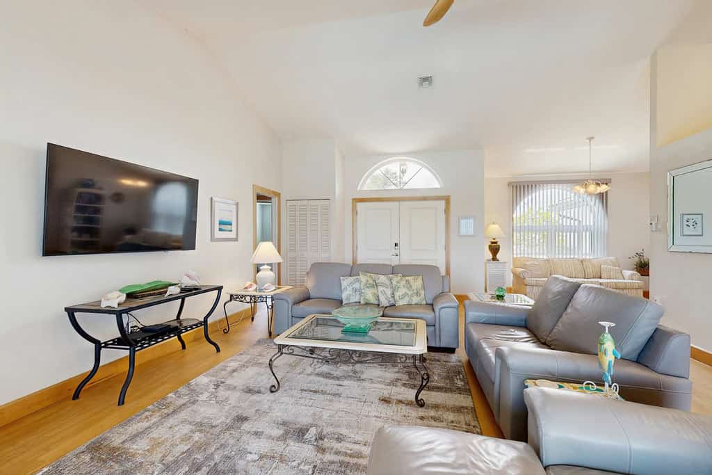 Waterfront pool home, family friendly, close to beaches with AC, WD and WIFI