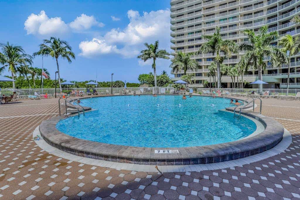 Gulf-view condo with private balcony, pool, tennis, beach access, & WiFi