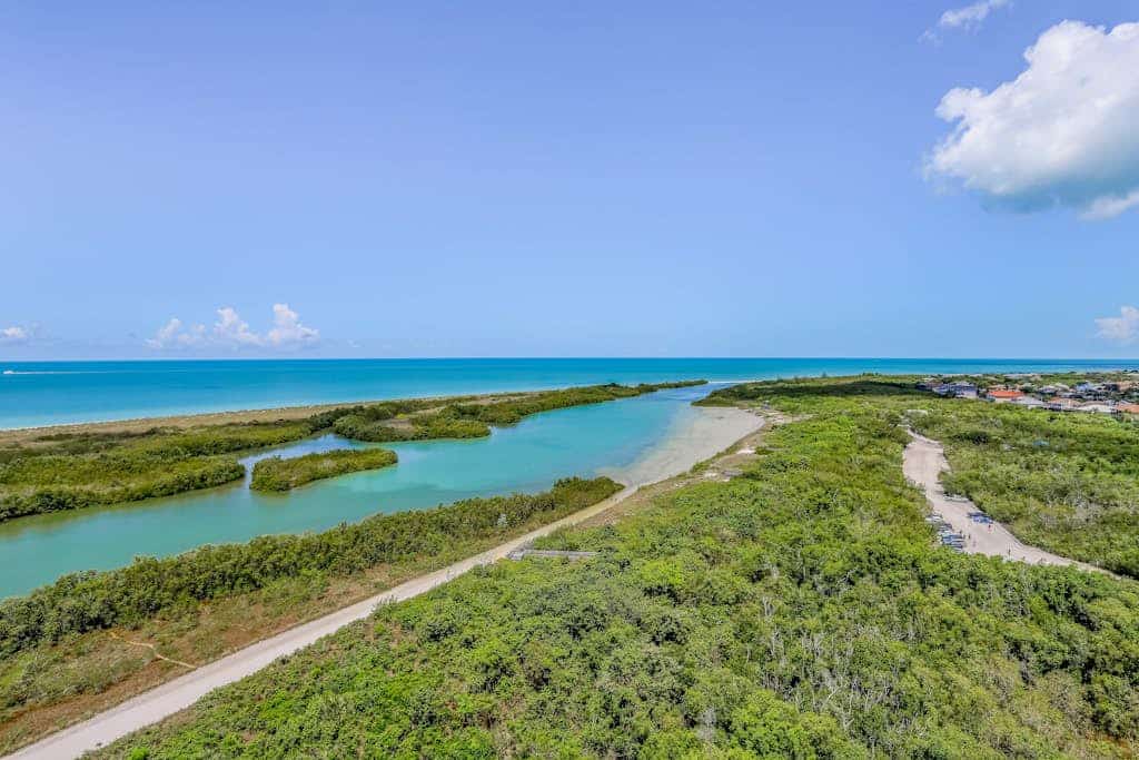 Gulf-view condo with private balcony, pool, tennis, beach access, & WiFi