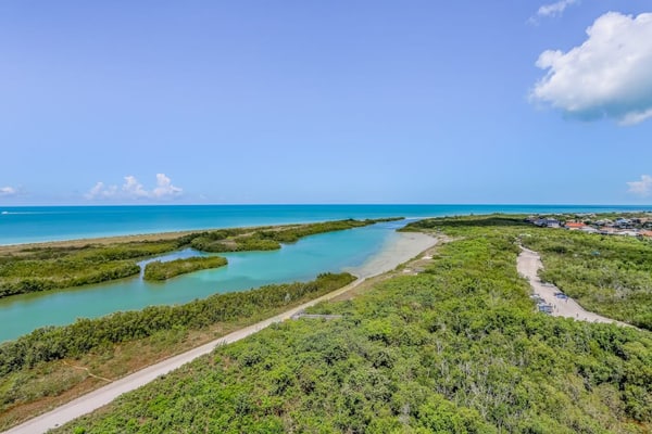 Gulf-view condo with private balcony, pool, tennis, beach access, & WiFi