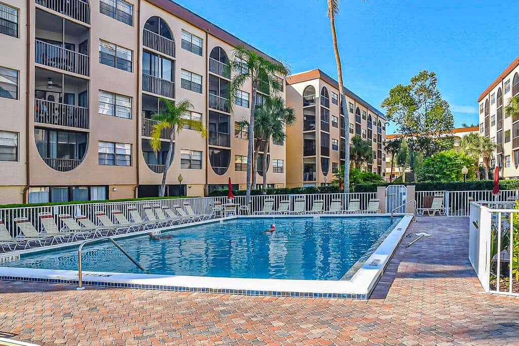 Charming waterfront condo with balcony views, hot tub, tennis courts & pool