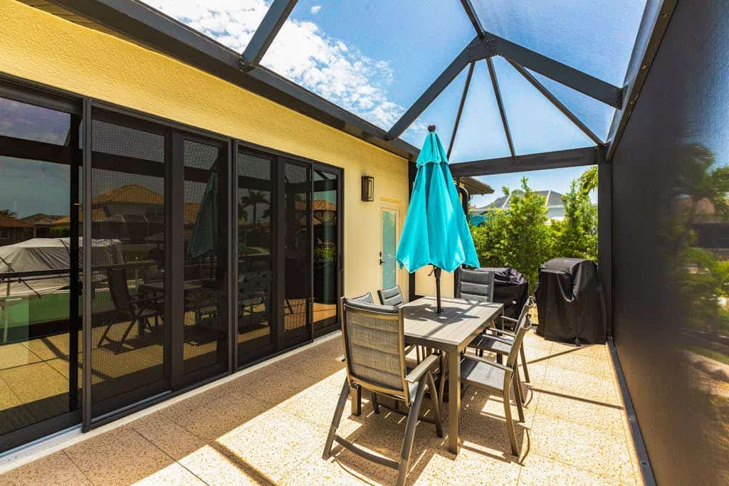 Modern waterfront retreat has pool with spa waterfall, close to Gulf beaches