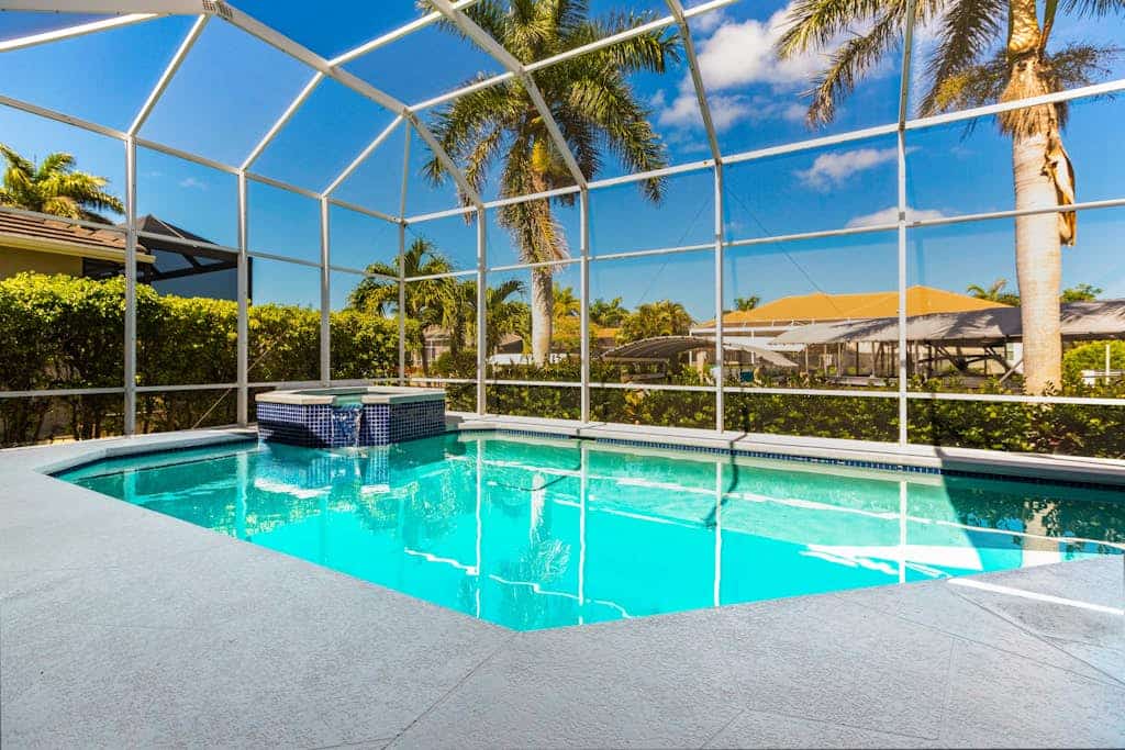 Elegant and luxurious waterfront home with heated pool, dog friendly, WIFI