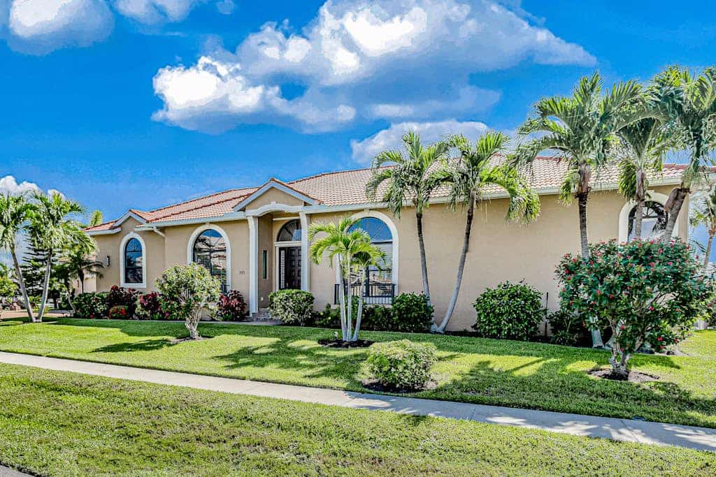 Canal-front home with fast WiFi, pool, & lanai - near beach