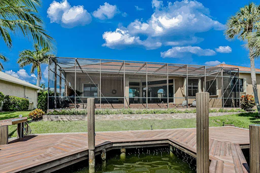 Canal-front home with fast WiFi, pool, & lanai - near beach