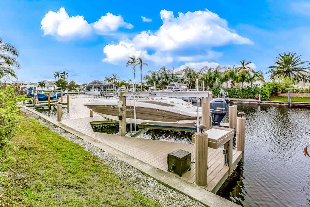 Dog-friendly home with pool, washer/dryer, central AC, dock - snowbird-friendly
