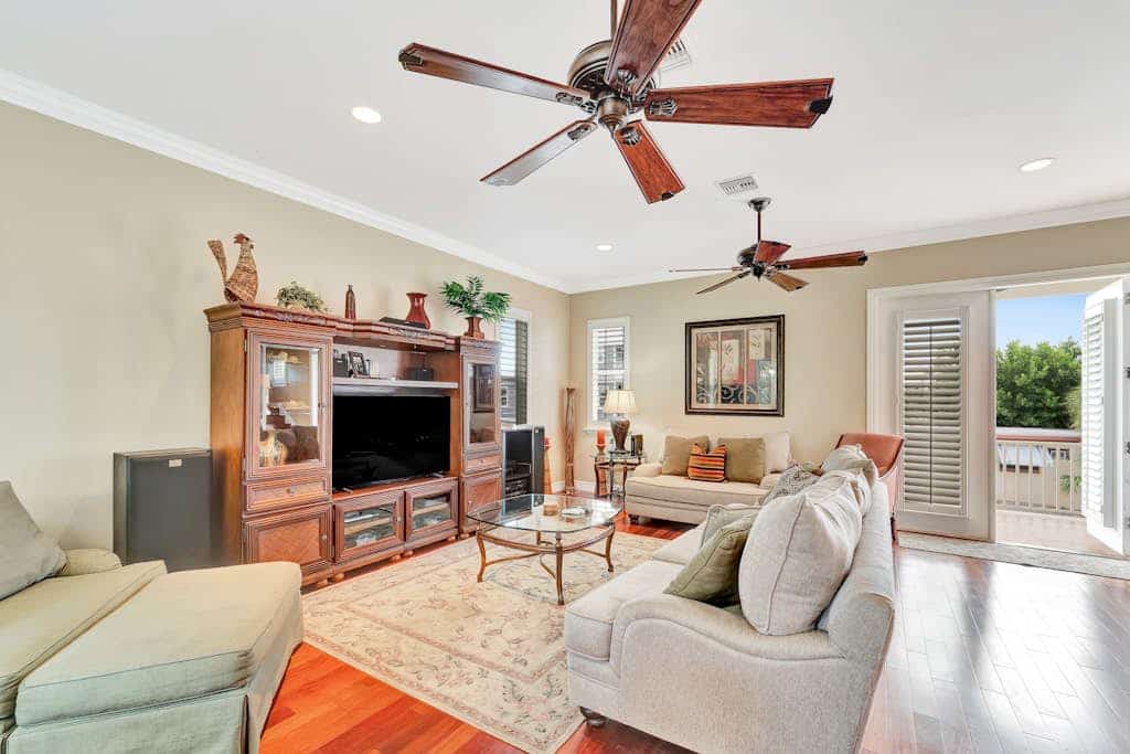 Water-view villa with sunset balconies, grill, & pool - walk to beach and dining