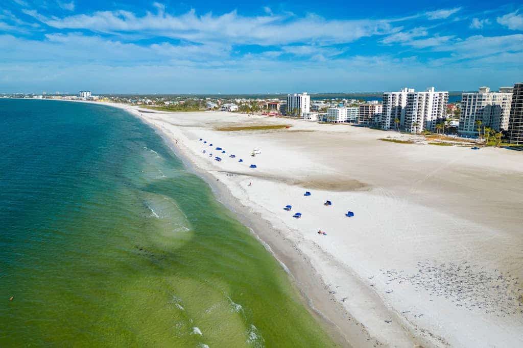 Coastal condo with shared pool, tennis court, and washer & dryer