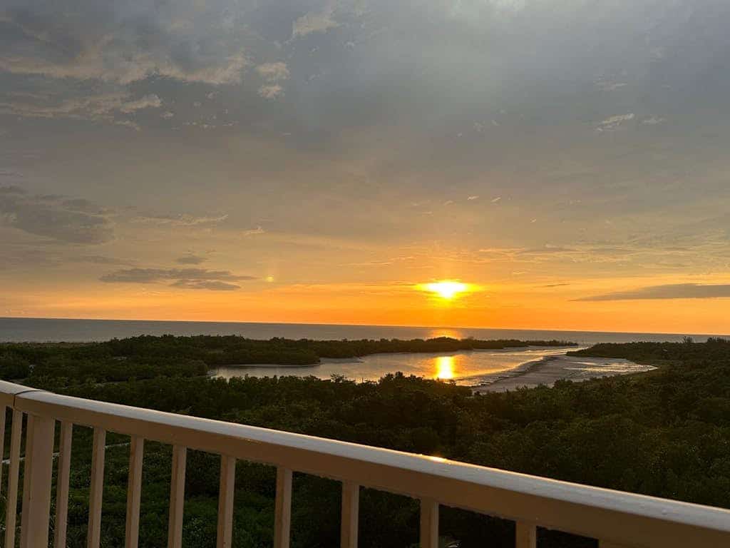 Waterfront, gulf view condo by beach with pool, dock & balcony