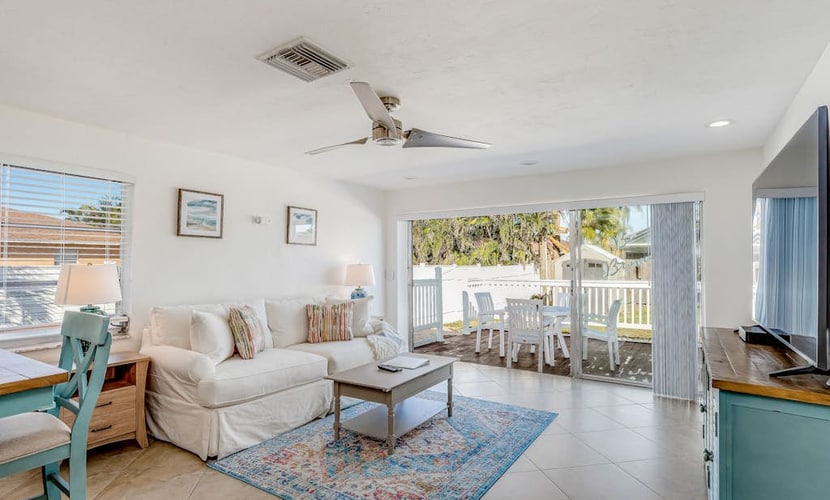 Dog-friendly home plus attached studio with fenced yard, washer/dryers, & AC