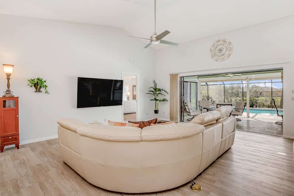 Canal-front home with sandy beaches, golf courses, dock, & refreshing pool