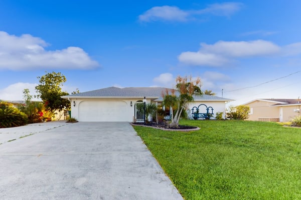 Snowbird Friendly Waterfront Escape with Private Pool, Dock & Serene Canal Views
