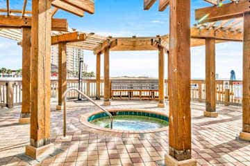 Gulf front condo with resort amenities, steps to the beach