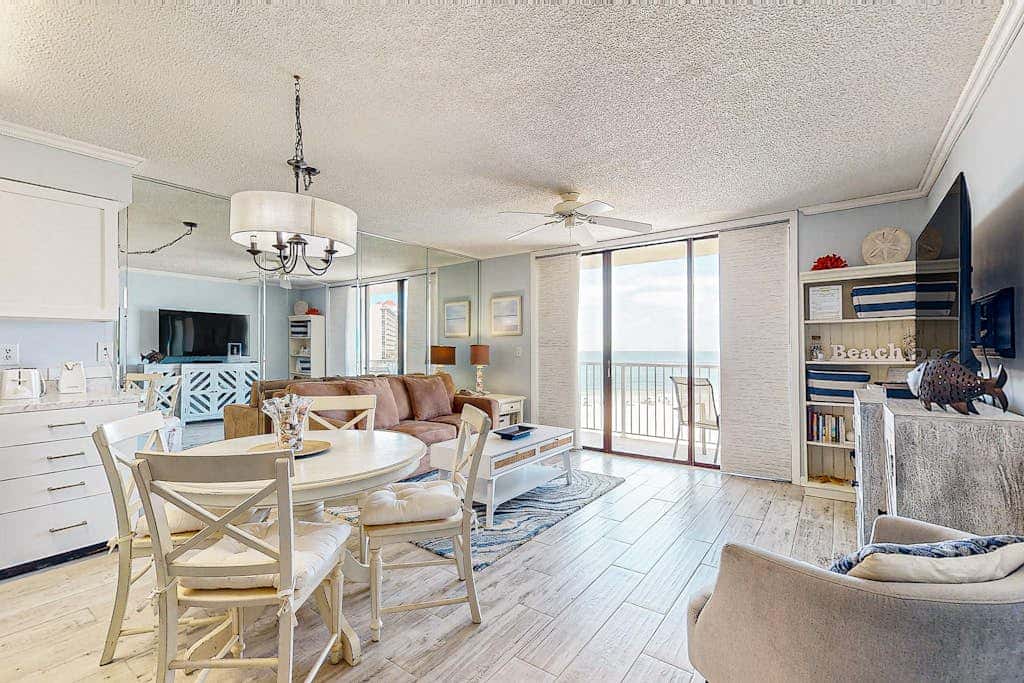 Gulf-view condo with central AC, WiFi, laundry, pools, gym & tennis