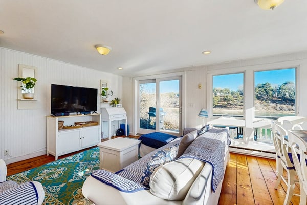 Breathtaking Riverfront Home with a Lovely Deck, Close to Beach - Dogs OK