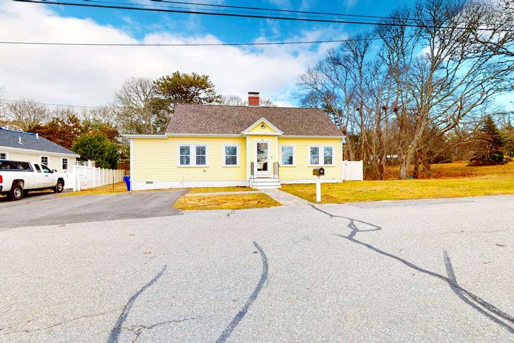 Inviting home + apartment near beach with furnished deck, yard, & grill