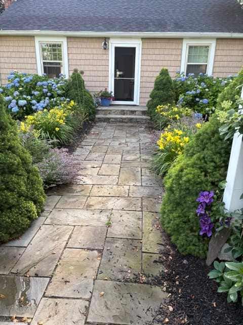 Renovated cottage steps from private beach with backyard, grill, bay views, AC
