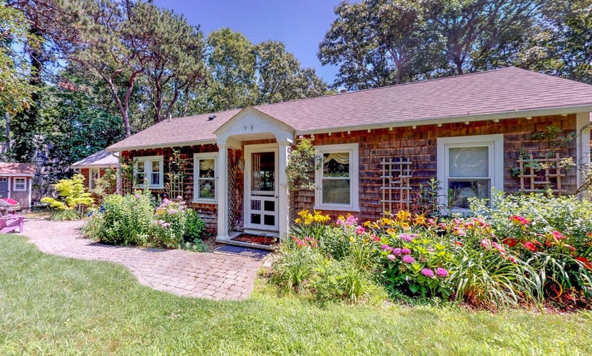 Adorable waterfront home w/ boat access & a three-season sunroom