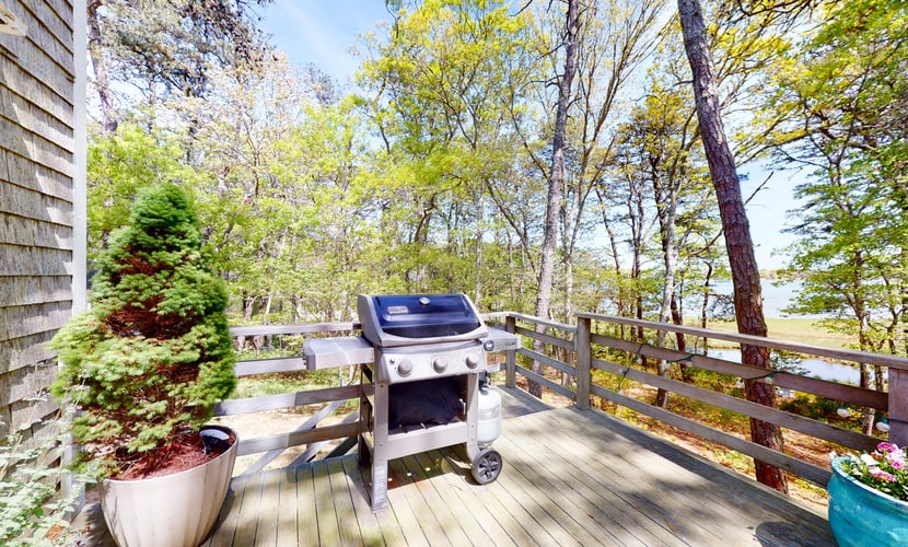 Waterfront escape with gas grill, furnished deck, fast WiFi, beach access nearby