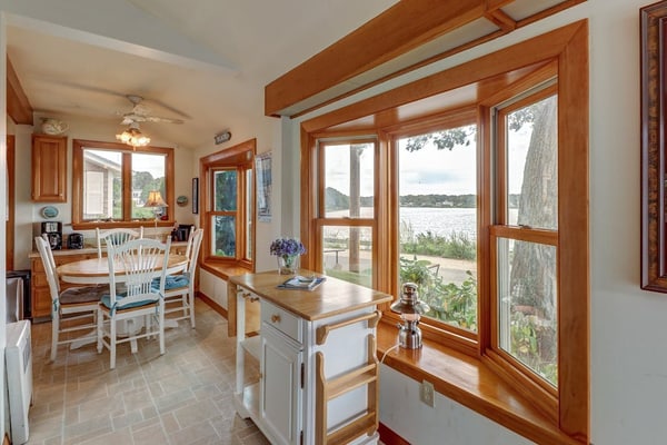 Lakefront home with beach views, WiFi, gas grill & patio - near beach