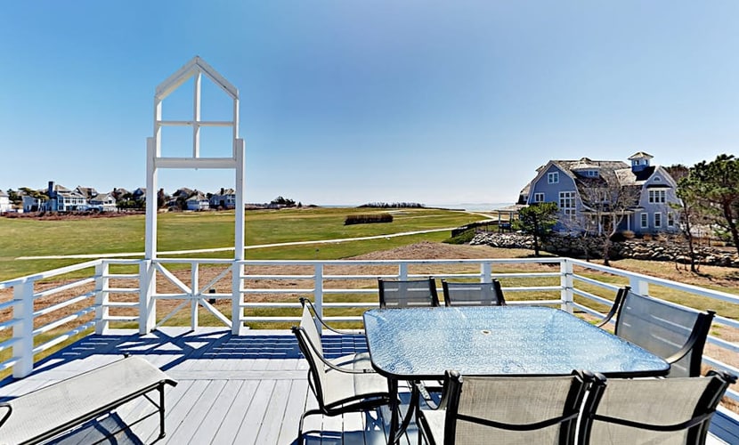 Spacious home on golf course with 4 outdoor spaces overlooking the Sound