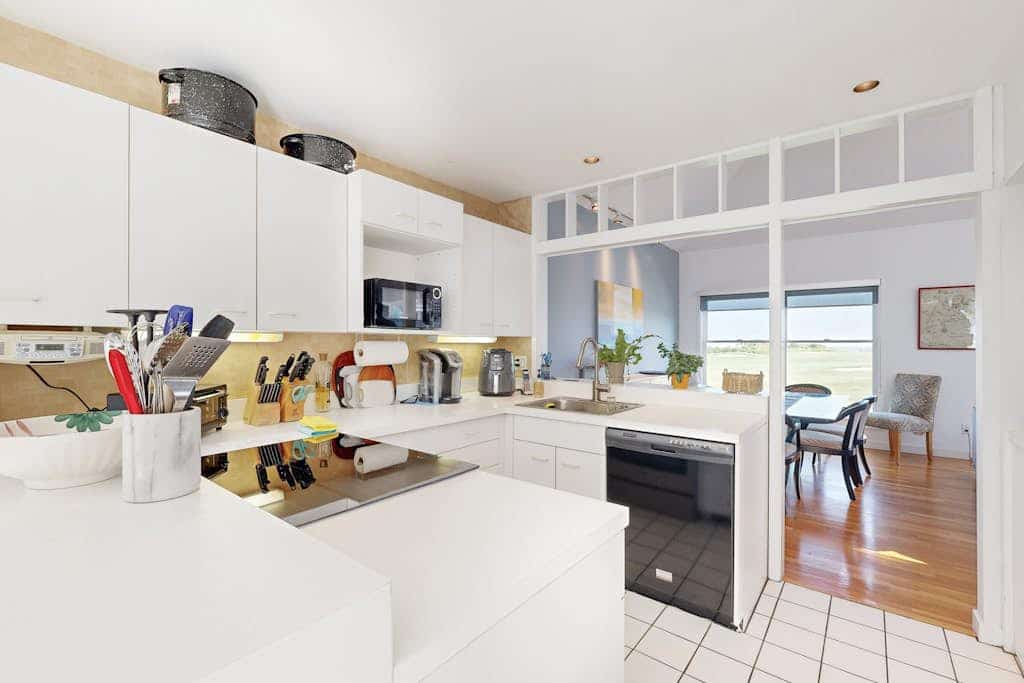 Spacious home on golf course with 4 outdoor spaces overlooking the Sound
