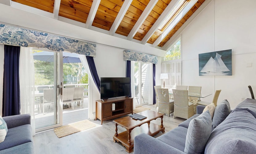 Summer home with expansive deck & wonderful location for beachgoers