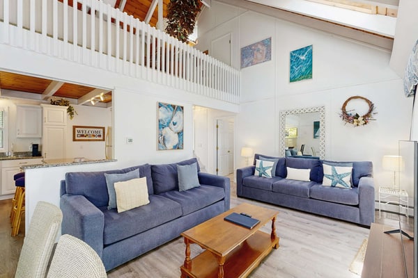 Summer home with expansive deck & wonderful location for beachgoers