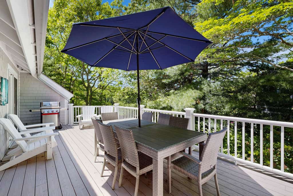 Summer home with expansive deck & wonderful location for beachgoers