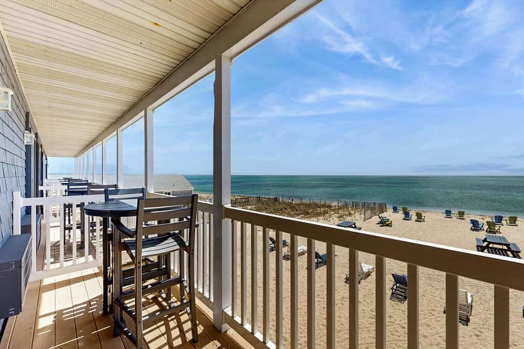 Oceanfront suite with bay-view balcony, full kitchen, AC & firepit