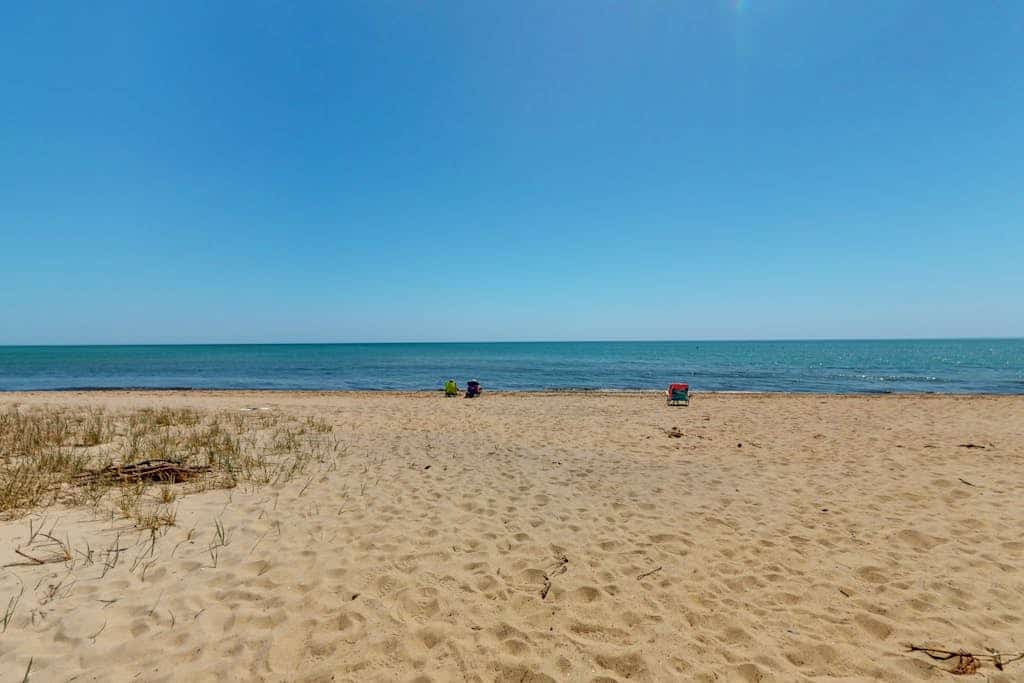 Coastal townhome with easy beach access, beach gear, balconies, grill, W/D, & AC