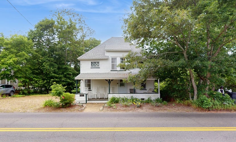 Spacious colonial home close to town with AC, porches, & W/D