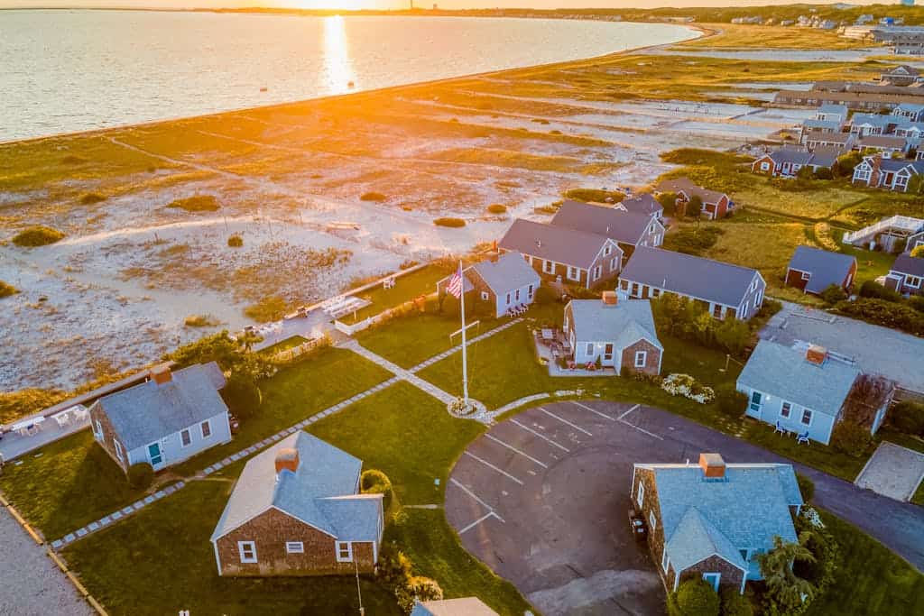 Oceanfront cottage near town with full kitchen, AC, beach access & patio