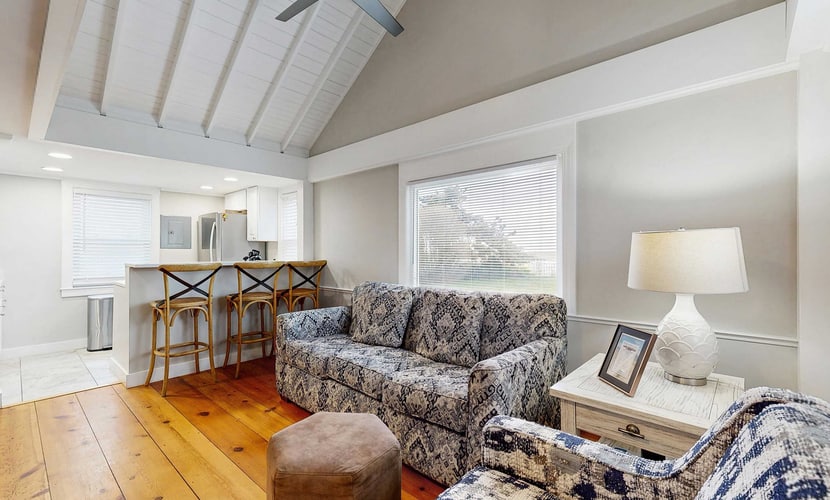 Oceanfront cottage near town with full kitchen, AC, beach access & patio