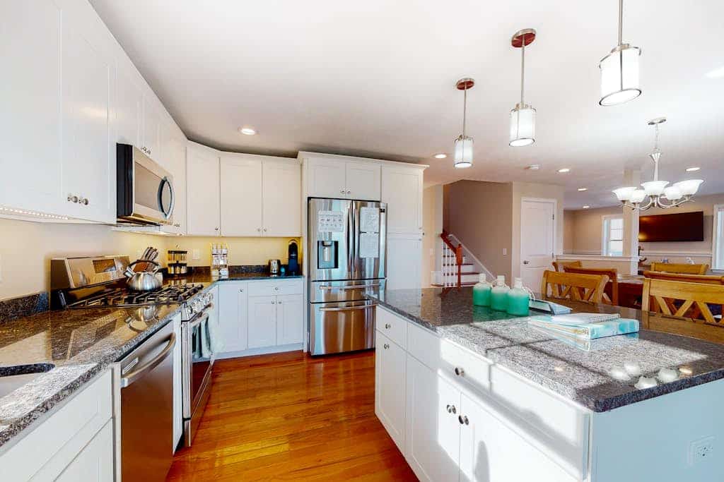 Comfortable home with rooftop deck, beach & water views, W/D, & central AC