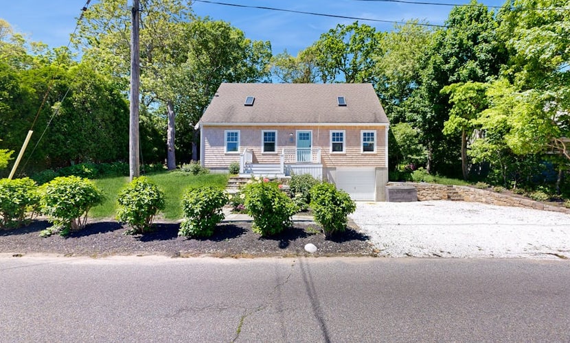 Charming home near downtown & beach with patio, outdoor shower, grill, & W/D