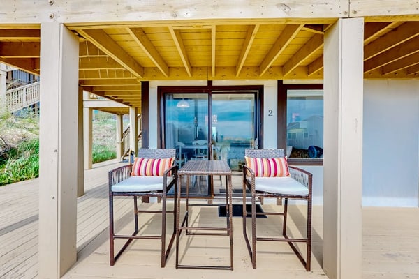 Ocean-view studio near golf with patio, beach gear, kitchenette, & partial AC