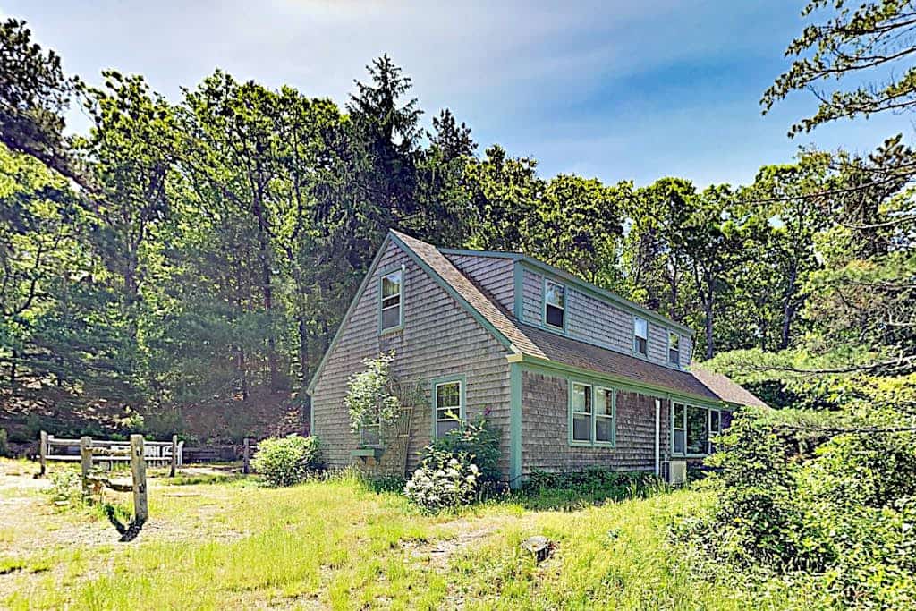 West-facing pure waterfront home in Orleans, overlooking Arey's Pond