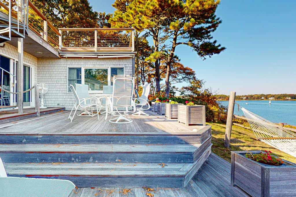 Enchanting waterfront home with two decks, grill, kayaks, board games, W/D, & AC