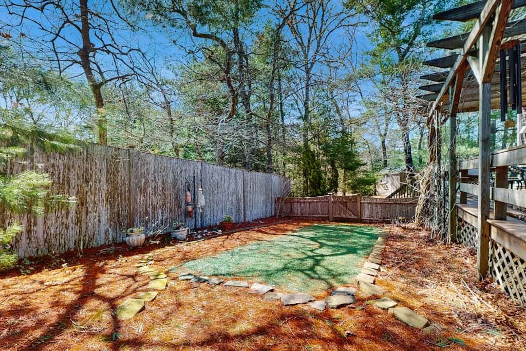 Charming home with open layout, deck, grill, AC, W/D, & yard