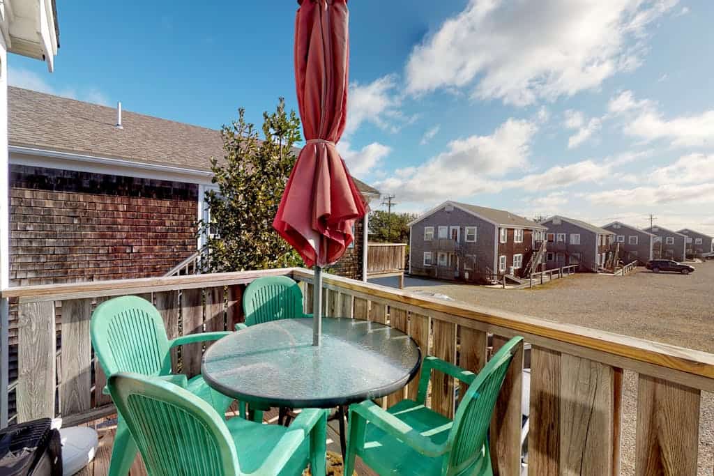 Condo near golf with with ocean views, firepit, balcony, & deck