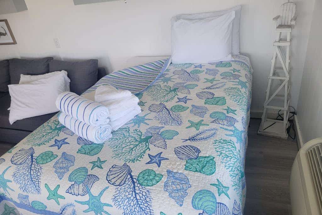 Charming studio steps to beach access with deck, ocean view, kitchenette & grill