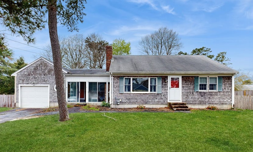 Quiet home in central location with deck, W/D, & large yard