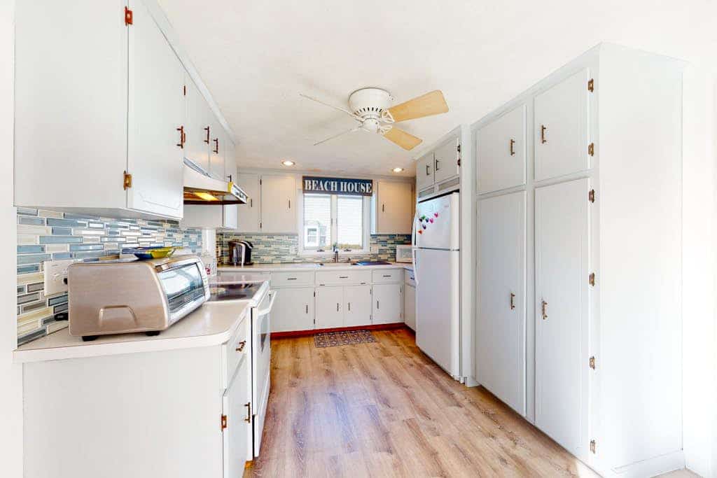Dog-friendly coastal home steps from beach with grill, firepit, & washer/dryer