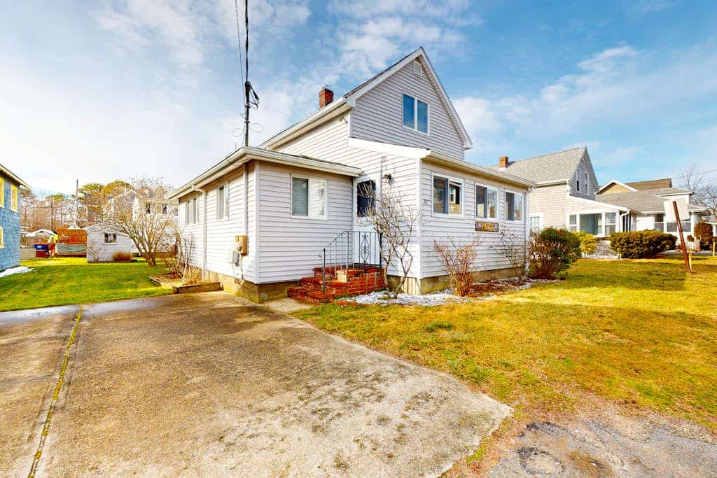Dog-friendly coastal home steps from beach with grill, firepit, & washer/dryer