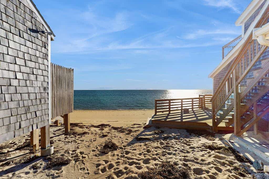 Cozy coastal condo steps from the beach with private deck & two parking spots