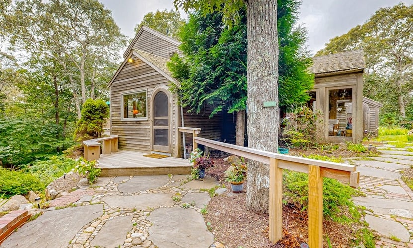 Charming 2-story house near the beach with inviting deck, large yard & canoe