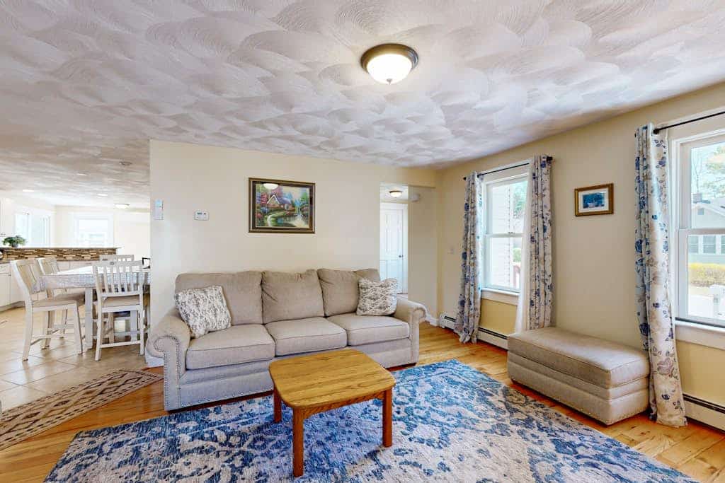 Charming coastal home with sunny rooms, private backyard, & walk to beach